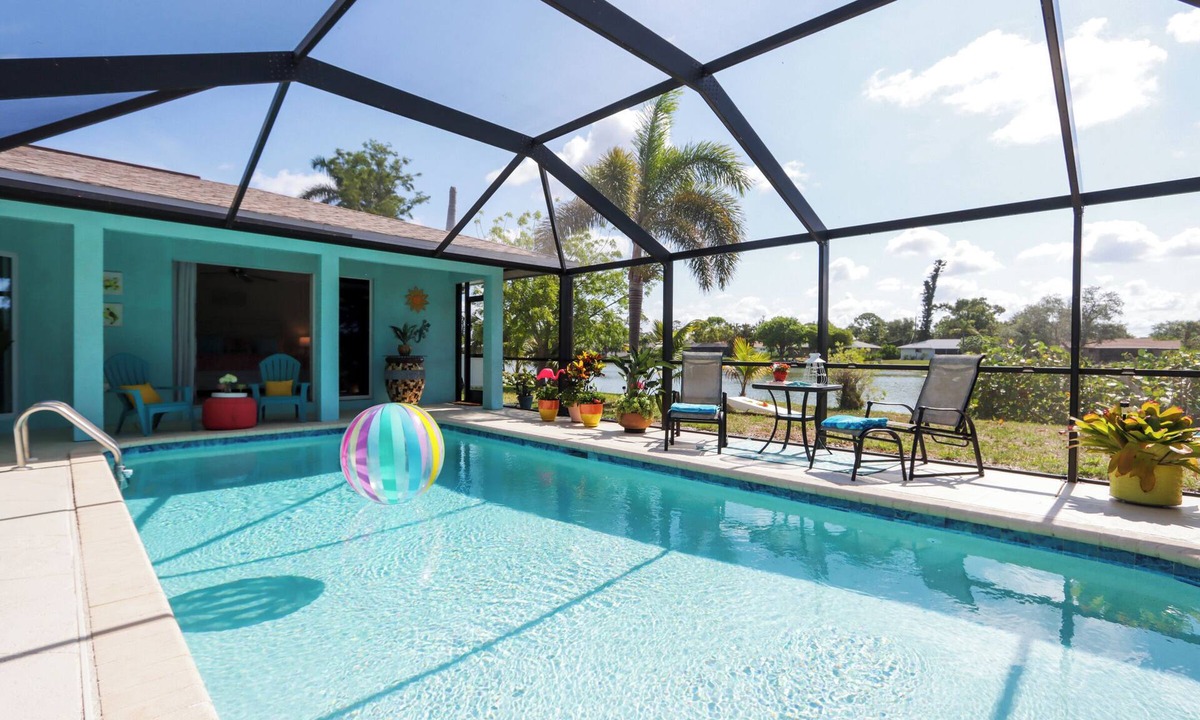 Iona House | A Splash Of Water - Family-Friendly Retreat with Private Heated Pool and Lakefront View