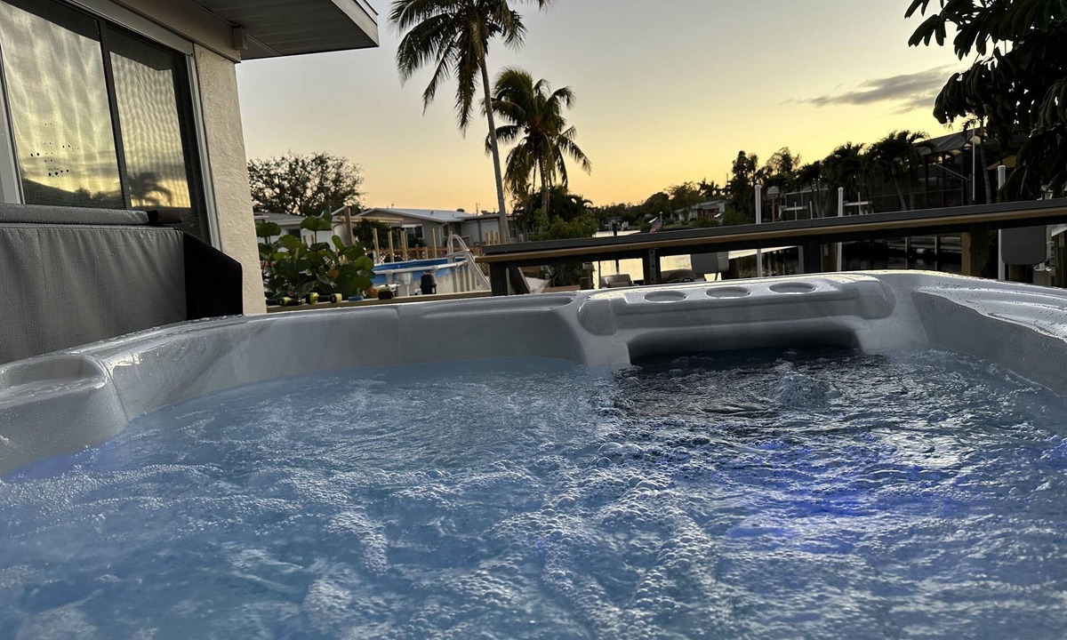 Lochmoor Waterway Estates House | Beautiful North Fort Myers Home w/Hot Tub & Boat Lift