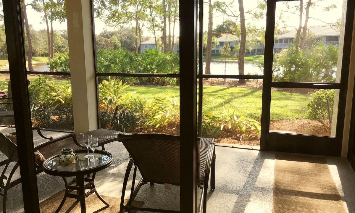 Bonita Bay Condo | Beautifully Renovated Lakeview Corner Condo. Private Beach, Pool and Spa