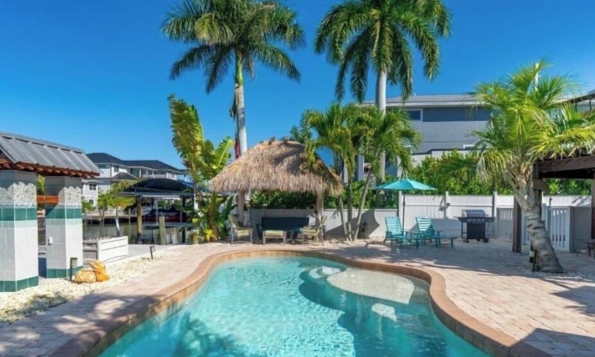 Fort Myers Beach House | Best Location on FMB! AWESOME SALTWATER POOL! WALK EVERYWHERE! 1st floor unit