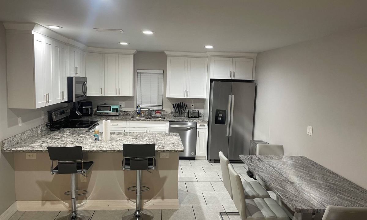 Centennial House | Cozy 2-bedroom house in serene Lehigh Acres Wifi Included.
