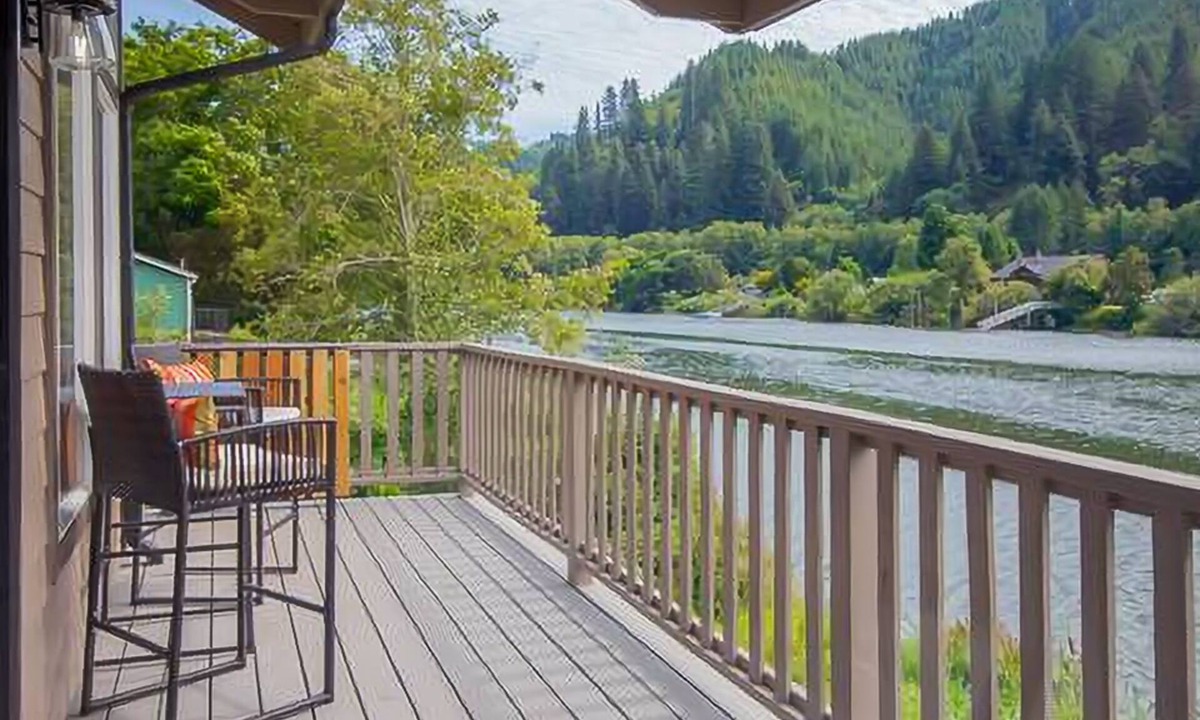 Mapleton House | Delightful riverfront home with dock, game room, fast WiFi, kayaks & grill