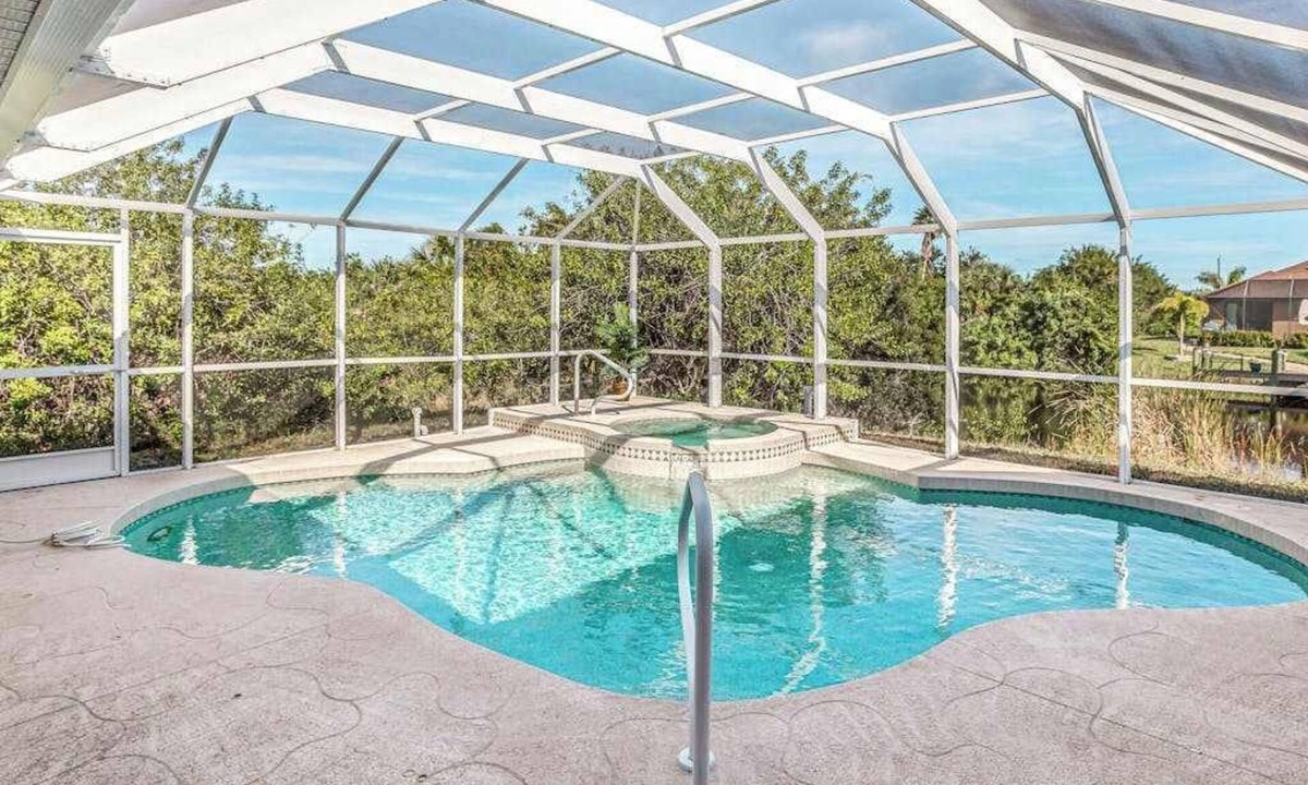 South Gulf Cove House | Dog-friendly home with private heated pool, grill, A/C, & washer/dryer