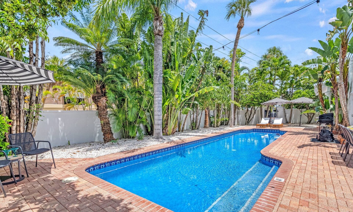 Saint Armands Key House | Five Palms | Stunning Lido Key Retreat with Private Pool, Firepit, and Steps to the Beach