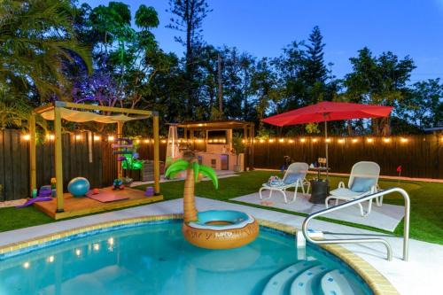South Bradenton Villa | Heated Pool & Spa Outdoor Kitchen/Theater/Games