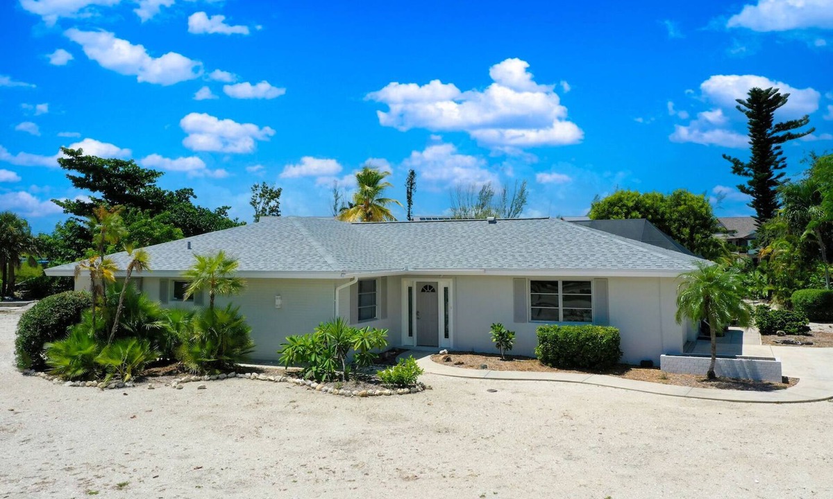 Shell Harbor House | Island Sanctuary: Canal Home with Pool, Pets OK!