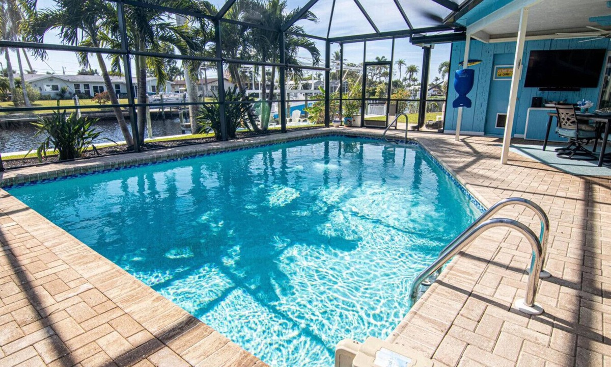 Lochmoor Waterway Estates House | `Latitude Adjustment` with Heated Pool and Boat Dock