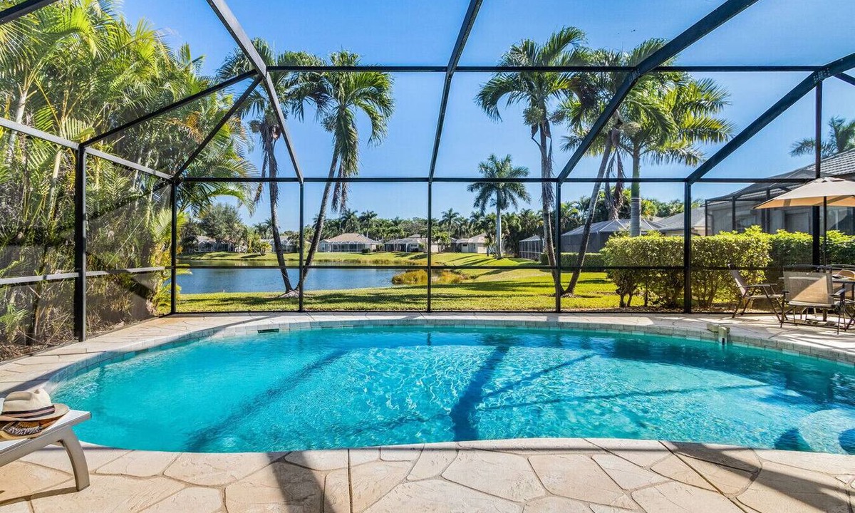 Central Naples House | Lazy days & lake views. Beautiful Naples pool home in Briarwood