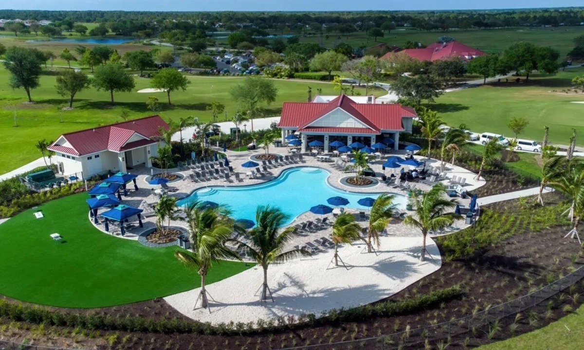 River Hall House | Luxury vacation living with water views, golf & resort-style pools.