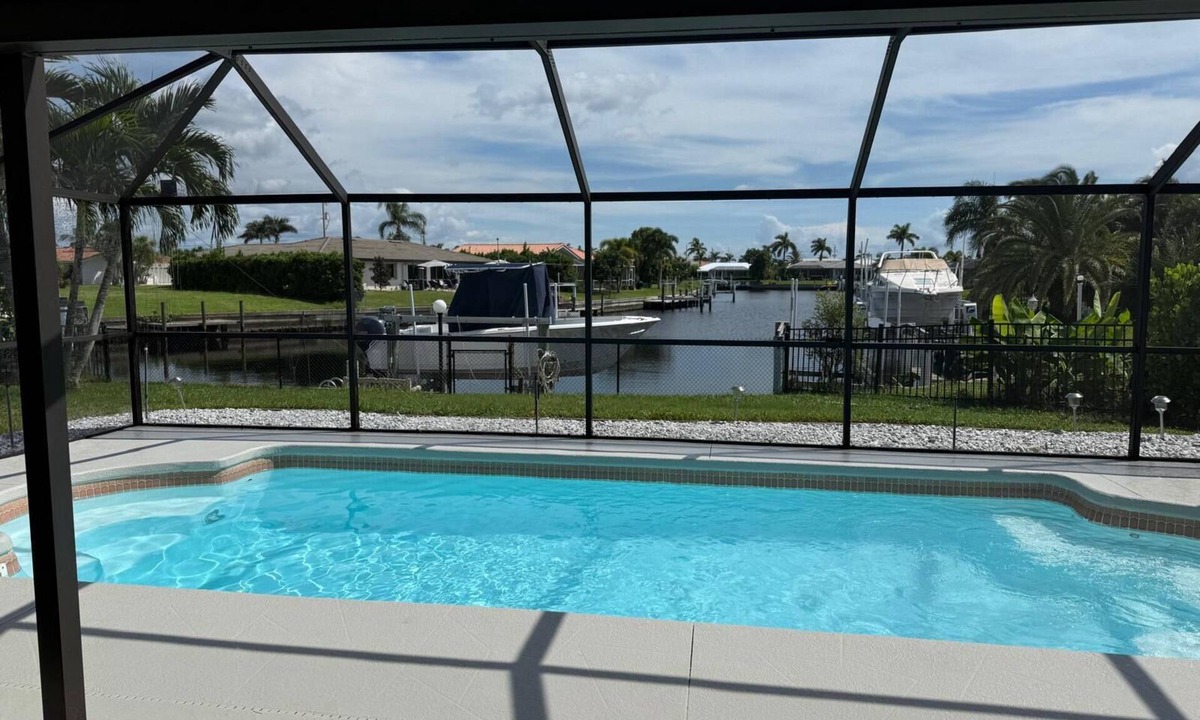 Punta Gorda House | NEW-Dockside dreams at Punta Gorda Isles-newly furnished home with heated pool.