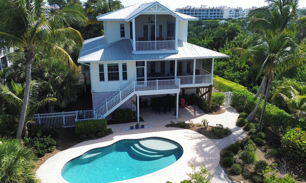Palm Island House | NEW! Palm Island with private pool, garage, screened porches, dock, 2 kayaks