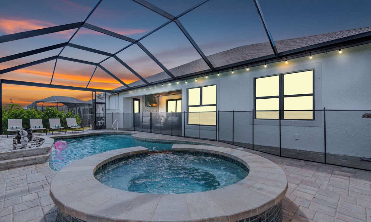 Trafalgar Villa | Relax at Coastal Vibes: Heated Saltwater Pool & Spa Game Room Waterfront View