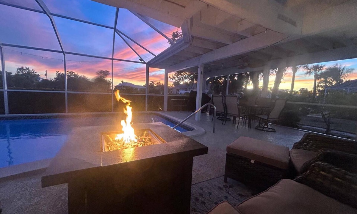 Edgewater House | Renovated house with huge screened and heated pool and canal on Charlotte Harbor