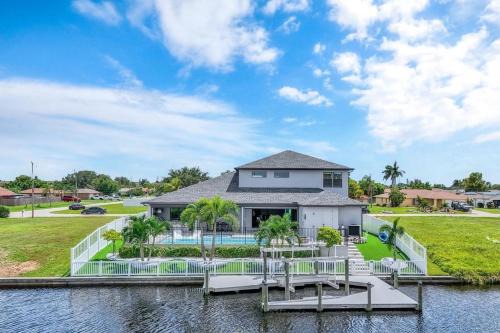 Fort Myers Villa | Saltwater Playhouse 1005 Luxury Pool & Spa Home w/Game Loft and