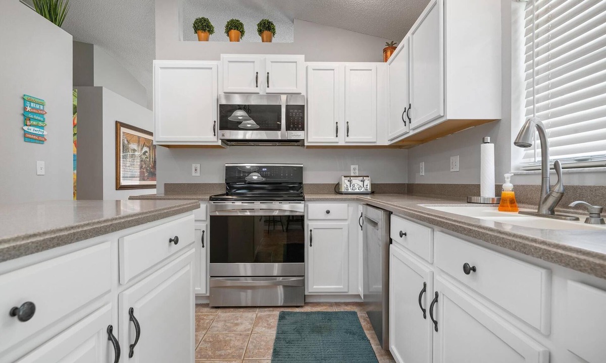 Sabal Harbour House | ⚓Shangri La Retreat! Lakefront private pool home w/bright, tropical design!⚓🌅