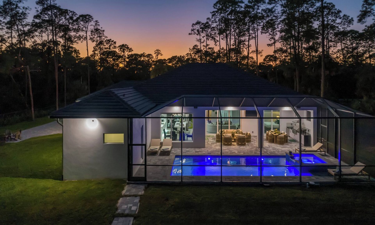 Rural Estates House | The Naples Luxe Retreat . Game Room Heated Pool