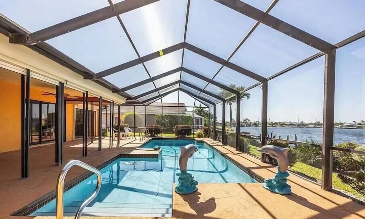 Eight Lakes House | Tropical Paradise with gulf access and heated pool