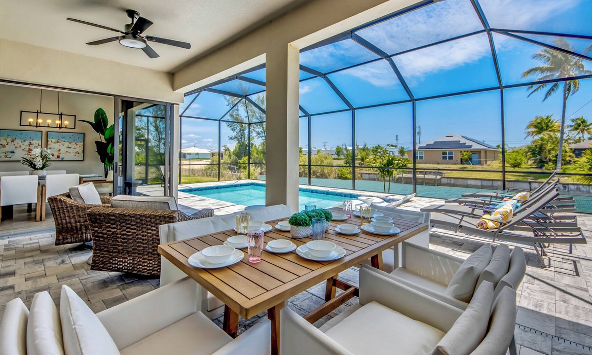 Trafalgar Villa | Villa Paradise - Exquisite 3 Bedroom/3 bath waterfront Villa with heated pool, guest suite, fishing poles