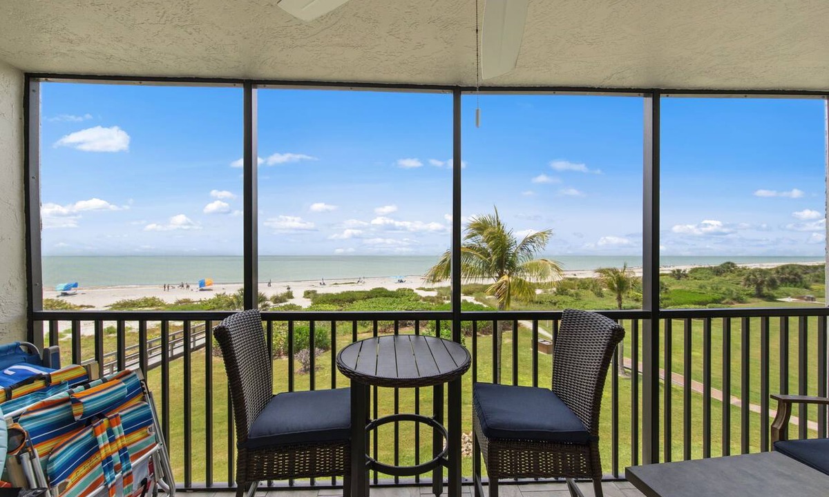 Sanibel Condo | Welcome to Loggerhead Cay 503, a beachfront corner condo with two private lanais showcasing breathtaking sunrise and sunset views. Sleeps 6 with beach gear, heated pool, tennis, pickleball, in-unit washer/dryer, and direct beach access.