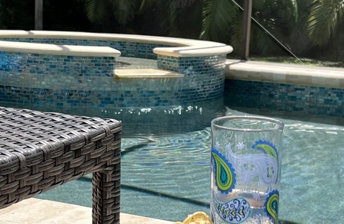 Naples Park House | ½ mile walk to Vanderbilt & Delnor-Wiggins Beaches on shaded sidewalk in a park.