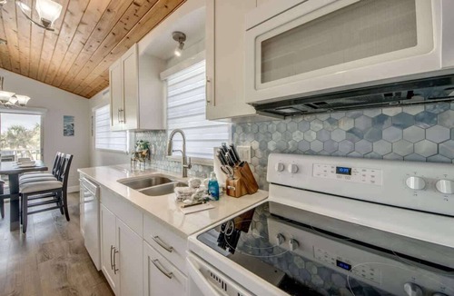 Mid Island House | 113 Gulfview Pool Oasis Steps from the Beach