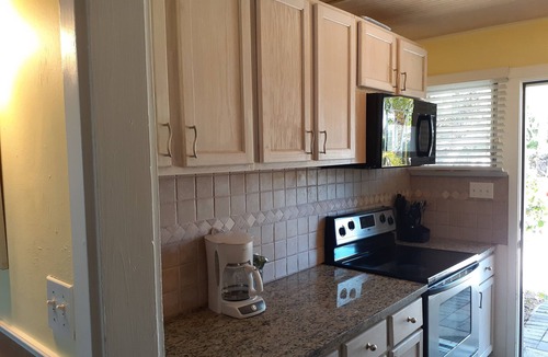 Longboat Key House | 2 BR Beach front villa with enclosed lanai overlooking the pool