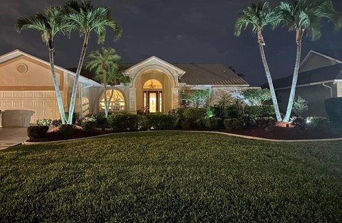 Pelican House | 25 Min to Fort Myers Beach, Canal front, large heated pool: Dive into Relaxation