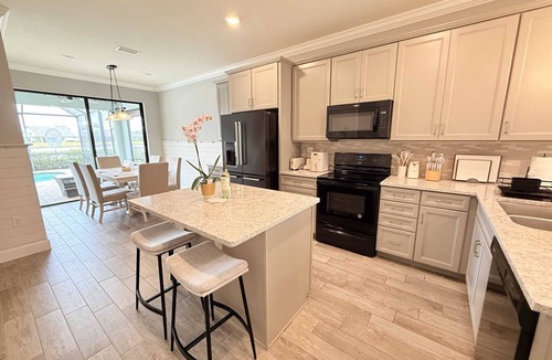 San Carlos Park House | 3BR Lakeside Retreat with heated pool/1 month min.