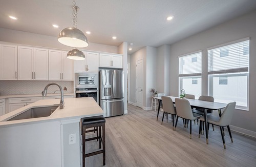 Downtown House | All the Florida fun you can have in this charming 3-bedroom townhome in downtow