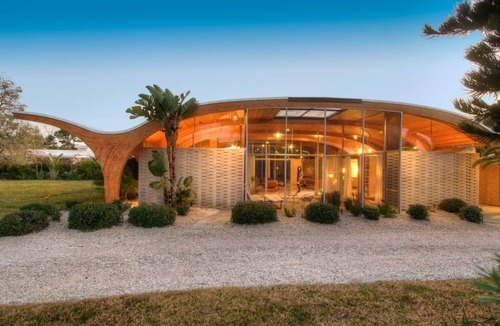 Golden Beach House | Architectural icon by Architect Victor A. Lundy. Prime location near beach.