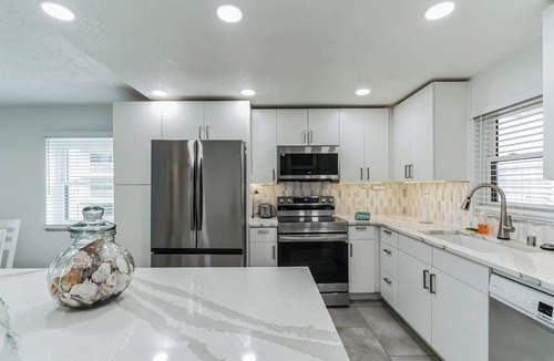 Sand Key Condo | Beachfront 2 bedroom, 2 bathroom renovated condo, pool, hot tub, private beach!