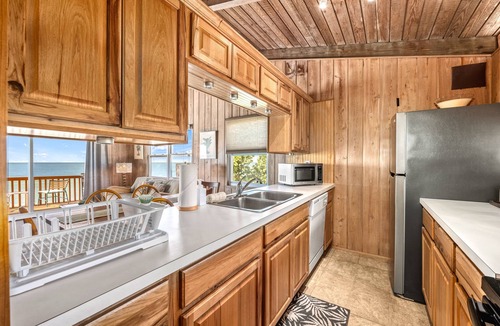 Englewood House | Beachfront Escape with Private Deck, Gulf Views, Resort Pool, Kayaks, and More!