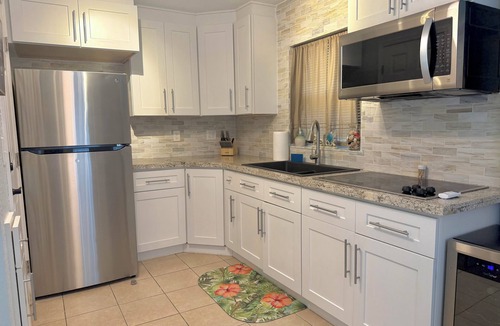 Fort Pierce Shores House | Beachside Bliss Indulge in Ultimate Tranquility <2 Block Walk W/SwimSpa & HotTub