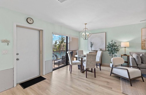 Shell Harbor Condo | Beautiful Canal Front Tennisplace C32 Condo close to everything! NEW!