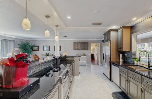 Lochmoor Waterway Estates House | Beautiful, dog-friendly home with in ground pool, putting green & sundeck