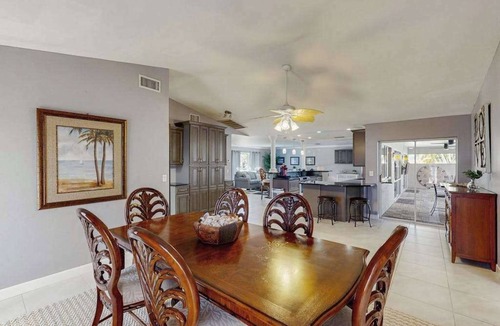 Lochmoor Waterway Estates House | Beautiful, dog-friendly home with in ground pool, putting green & sundeck