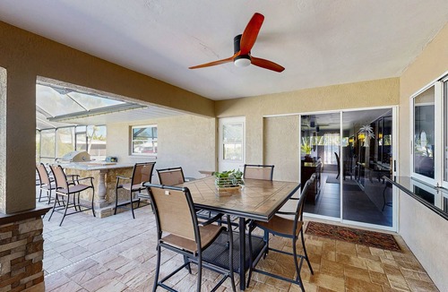 Lochmoor Waterway Estates House | Beautiful, dog-friendly home with in ground pool, putting green & sundeck
