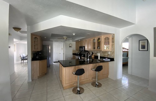 Pelican Villa | Beautiful Gulf access canal views with heated pool.