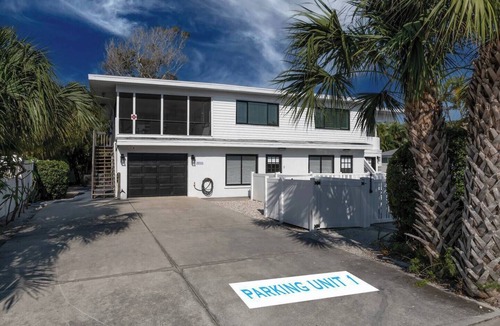 Ilexhurst Condo | Beautiful Spacious 4 Bdrm 2nd floor Condo! Heated Pool and Steps to the beach!
