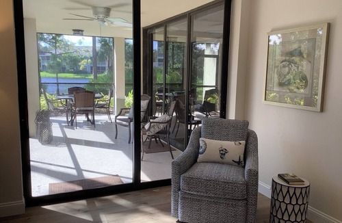 Bonita Bay Condo | Beautifully Renovated Lakeview Corner Condo. Private Beach, Pool and Spa