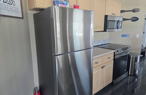 Mid Island House | BRAND NEW 16x14 Heated Swim Jacuzzi Sleeps 8 Beach Front! No Condo Park 4 Cars!