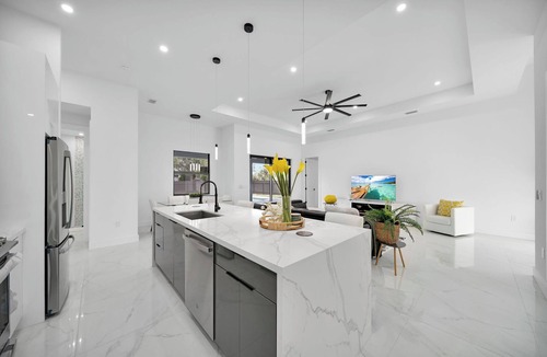 Mariner House | Brand New 4-bedroom heated pool house with Games, Fitness and office Space!