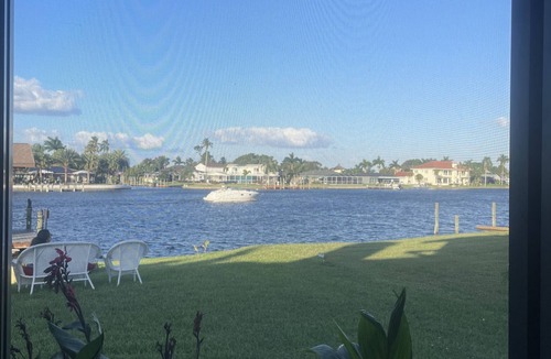 Fort Myers Shores House | Caloosahatchee River house with stunning water views, minutes to beaches.