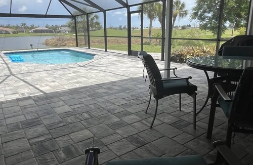 Pebble Beach House | Canal-front home with private pool, grill, patio, AC, W/D & gorgeous views