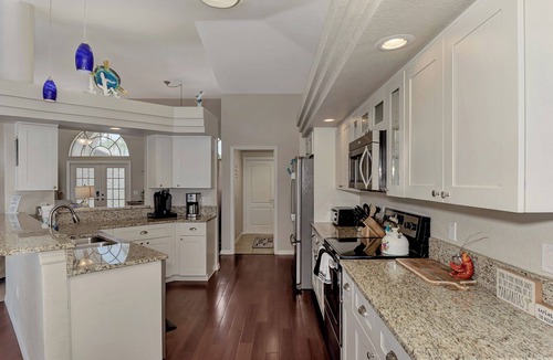 South Gulf Cove House | Canal Home w/Escape Room, Pool & Dock, Pets OK