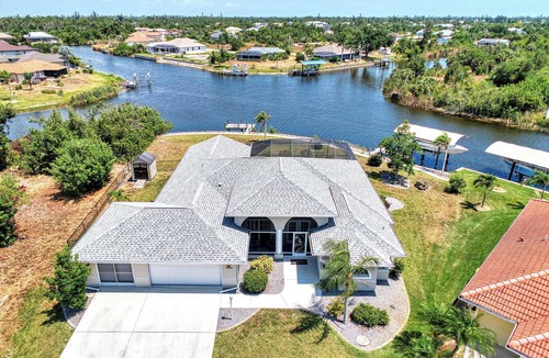 South Gulf Cove House | Canal Home w/Escape Room, Pool & Dock, Pets OK