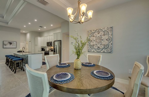 Pelican Villa | Cape Paradise - Magnificent 4 BR Villa with heated saltwater pool, kayaks, bikes, and fishing poles