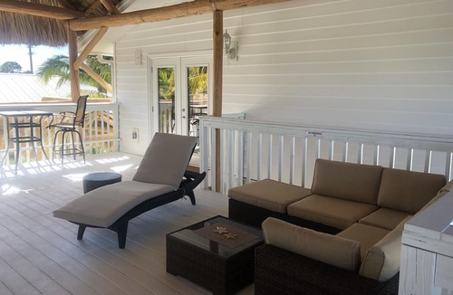Englewood Apartment | Caribbean Tiki Hut relaxation. Enjoy the Islands & Boca Grande without the costs