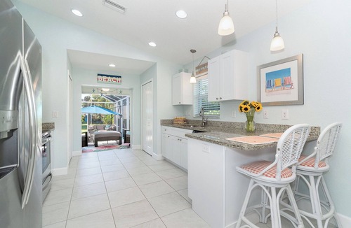 Englewood House | Charming 2-bedroom beach themed Englewood house with heated pool and large yard.