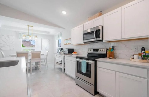 Gulf Cove House | Charming 3-bedroom 2-bath, 2-car garage, fenced yard with EV Charger